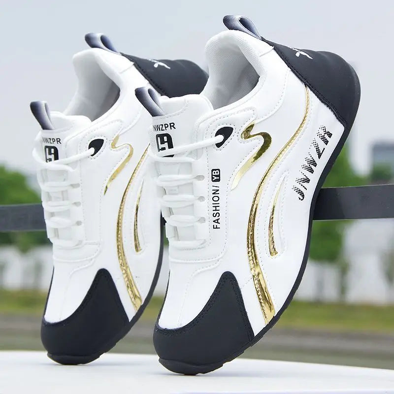 breathable sneakers for comfort - stylish white and black sneakers with gold accents.